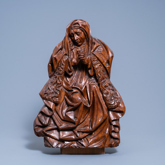 A large Flemish or French carved wood altarpiece fragment of a Golgotha scene depicting Mary Magdalene, 19th C.