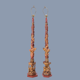 A pair of large Chinese Straits or Peranakan market gilt and lacquered wood candle stands with dragons and Buddhist lions, 19th C.