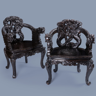 A pair of Japanese carved wood 'dragon' chairs, 19th/20th C.