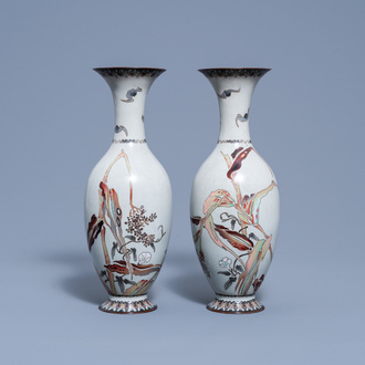 A pair of Japanese cloisonné vases with floral design and bats, Meiji, 19th C.
