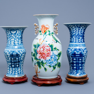 A pair of Chinese blue and white yenyen vases and a famille rose vase with floral design, 20th C.
