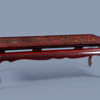 A Chinese red-lacquered wood 'dragon and phoenix' table, 19th/20th C.