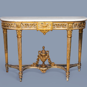 A large French Louis XVI style gilt and patinated wood console with marble top, 19th C.