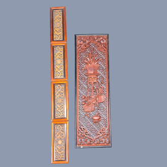 Two Chinese lacquered and gilt wood reticulated panels, 19th/20th C.