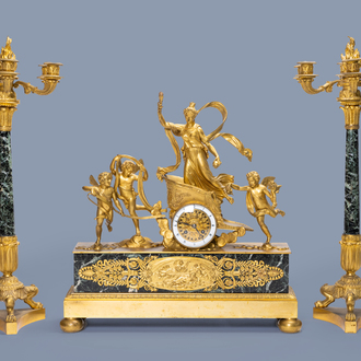 A French gilt bronze vert de mer marble three-piece clock garniture with the chariot of Venus, 19th C.