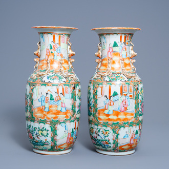 A pair of Chinese Canton famille rose vases with palace scenes and birds among blossoming branches, 19th C.