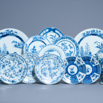 A varied collection of Chinese blue and white plates and chargers and a vase with figurative design all around, 18th/19th C.