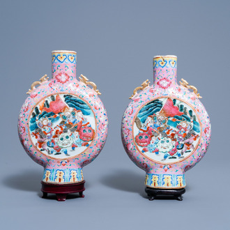 A pair of Chinese famille rose moon flasks with warrior scenes and pheasants among blossoming branches, 19th C.