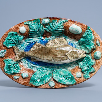 François Maurice (1846-1896): An oval polychrome Palissy style charger with a fish, 19th C.