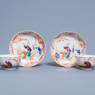 A pair of Chinese famille rose 'Mandarin' cups and saucers, Qianlong