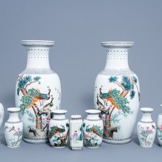 Nine Chinese famille rose vases with birds among blossoming branches and a figure in a garden, 20th C.