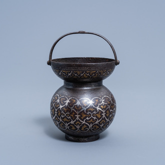 An Indian gold- and silver-inlaid damascened steel Hindu Kamandal holy water pot, 18th/19th C.