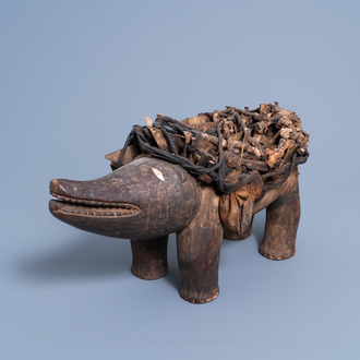 A 'Nkisi N'Kondi' figure of a dog, mixed media, Yombe, Congo, 20th C.