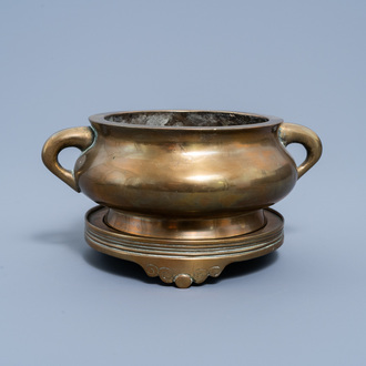 A Chinese bronze censer and cover on stand, Xuande mark, 19th C.