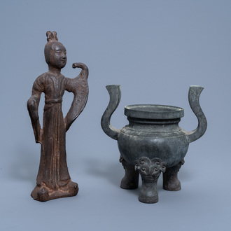 A Chinese bronze censer and a cast iron figure of a lady, Ming and Qing