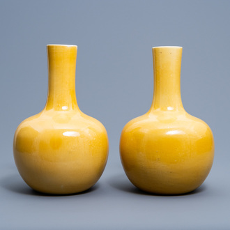 A pair of Chinese monochrome yellow tianqu ping vases, 20th C.