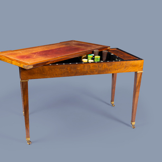 A French mahogany trictrac game table with leather top, 18th/19th C.