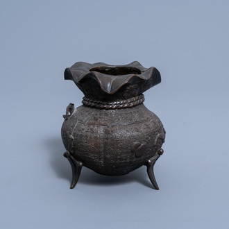 A Chinese bronze tripod vase, Qing