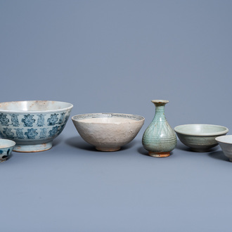 Five blue and white and celadon glazed bowls and a vase, China and Southeast Asia, Ming and later