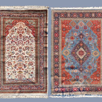 Two Oriental rugs with floral design, a.o. a Sarouk rug, wool on cotton, 20th C.