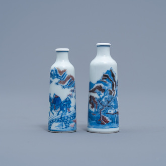 Two Chinese blue, white and copper red snuff bottles, 19th/20th C.