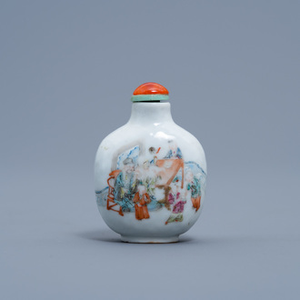 A Chinese famille rose snuff bottle with figures and animals in a garden, Daoguang mark and of the period