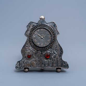 A Polish Art Nouveau style silver mantel clock with floral design set with cabochons, Orno, 20th C.