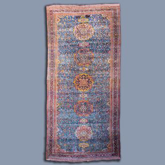An exceptional Oriental Qashqai rug with floral design, wool on cotton, Iran, first half of the 20th C.