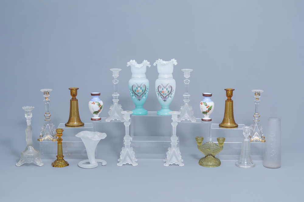 A varied collection of glass candlesticks and vases, a.o. opaline glass with floral design, various origins, 19th/20th C.