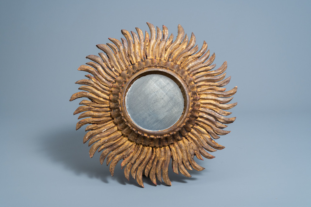 A gilt wooden sun mirror, 20th C.