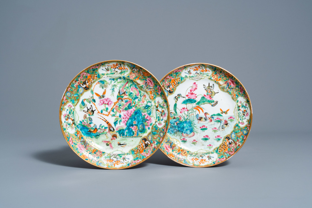Two Chinese Canton famille rose plates with butterflies and birds among blossoming branches, 19th C.