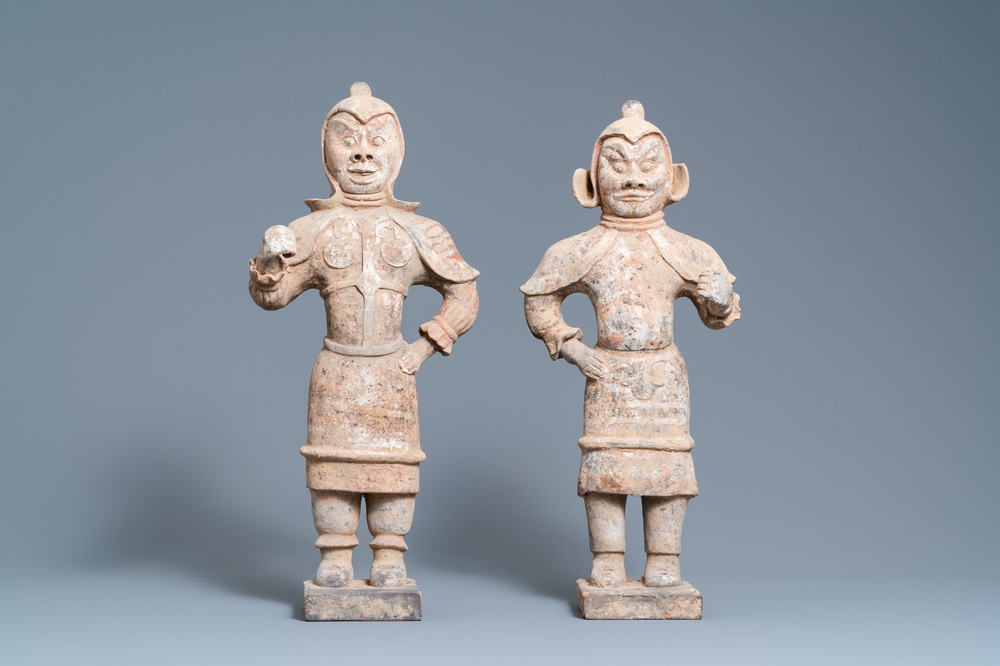 Two tall Chinese pottery 'Lokapala' figures, Tang Dynasty, 7th/10th C.